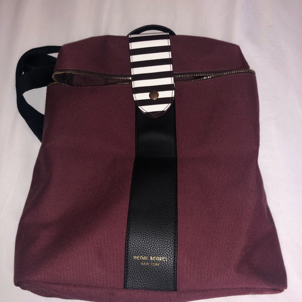 Canvas burgundy backpack with single top zipper